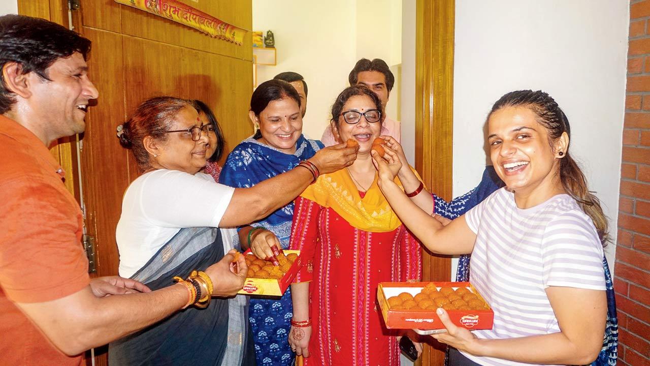 Family members celebrate after Supreme Court grants bail. Pics/PTI