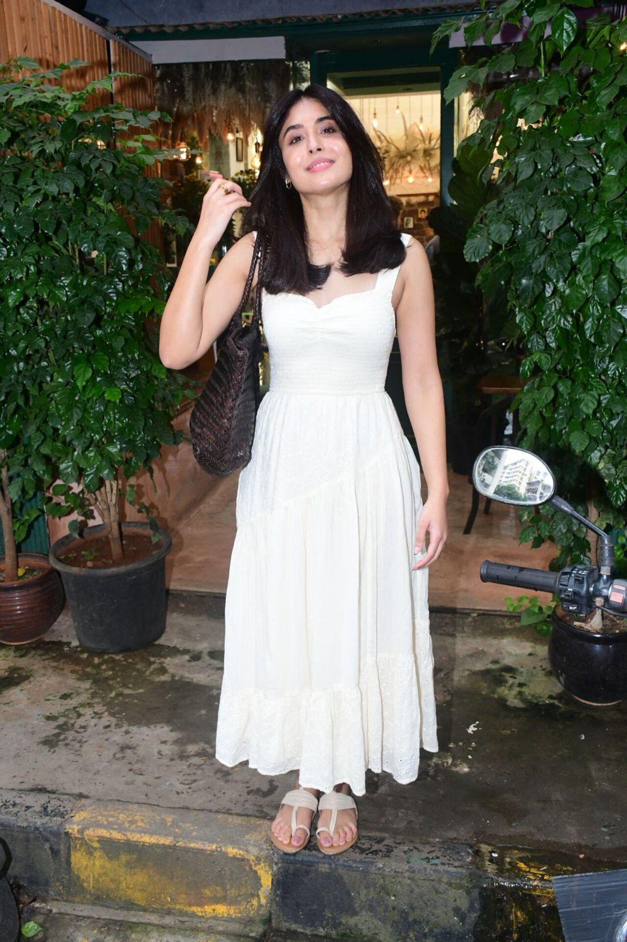 Kritika Kamra stunned in a white outfit after a hair session at a salon in the city