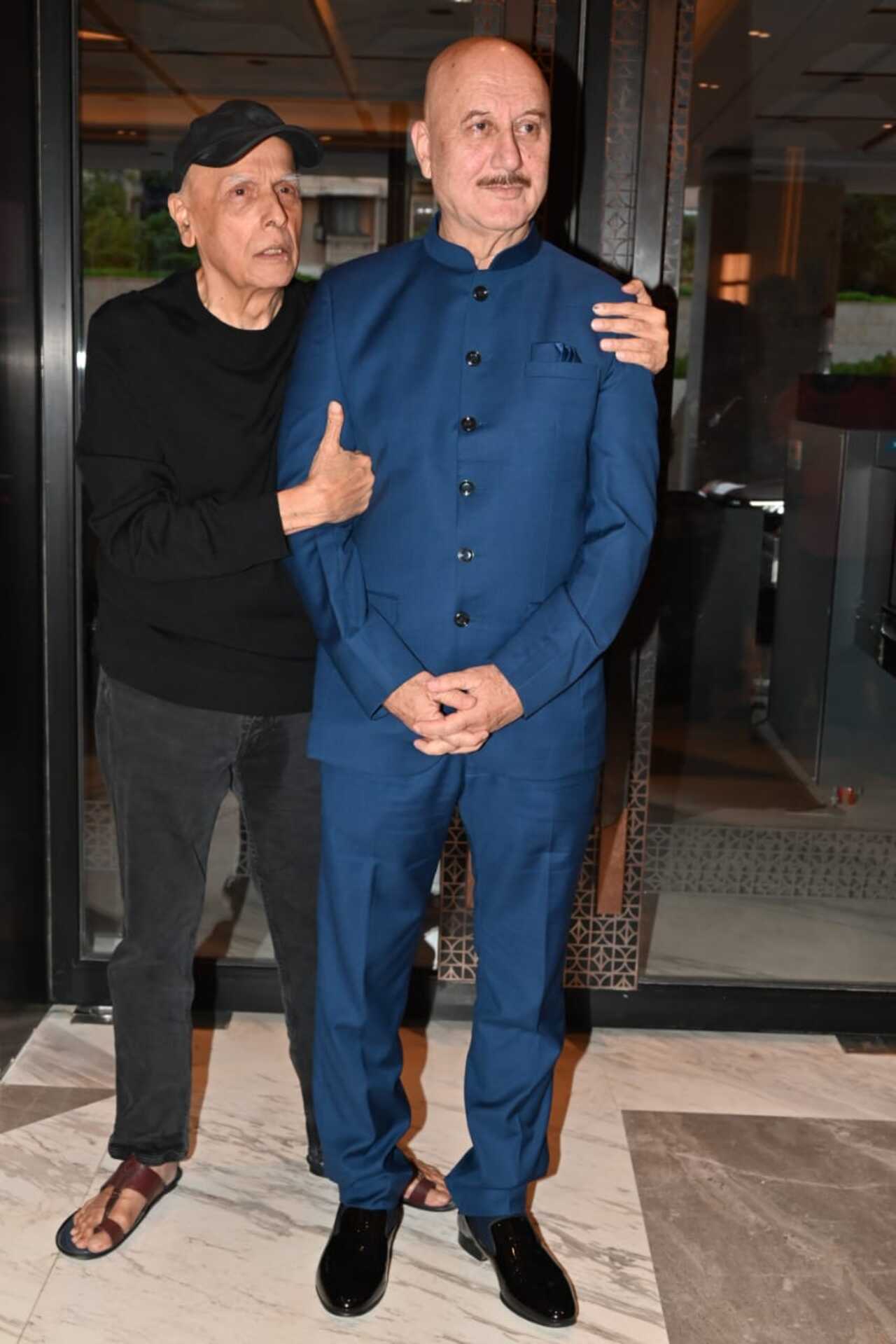 Mahesh Bhatt poses with Anupam Kher at the event