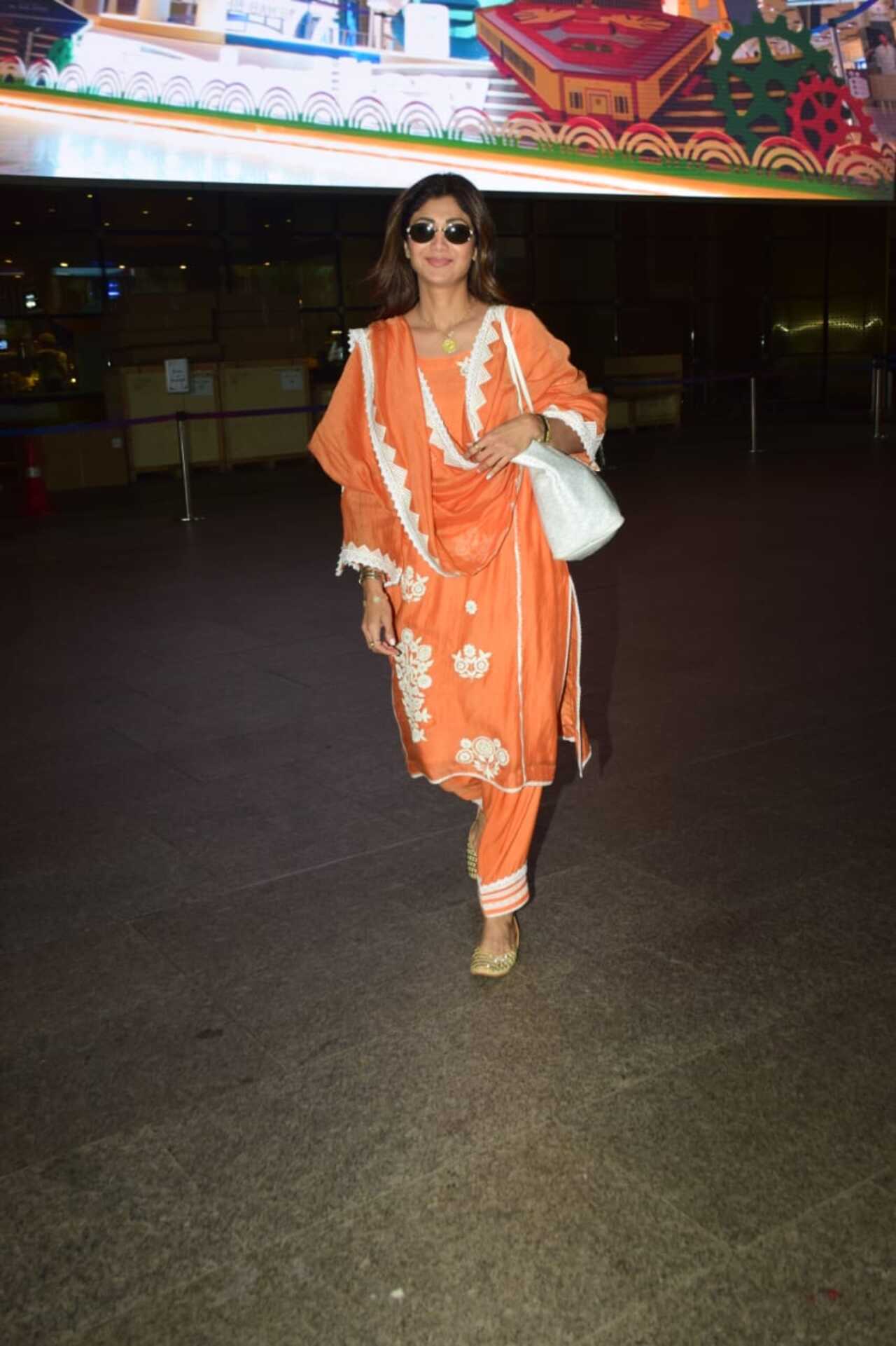 Shilpa Shetty Kundra spotted at the airport in an orange suit