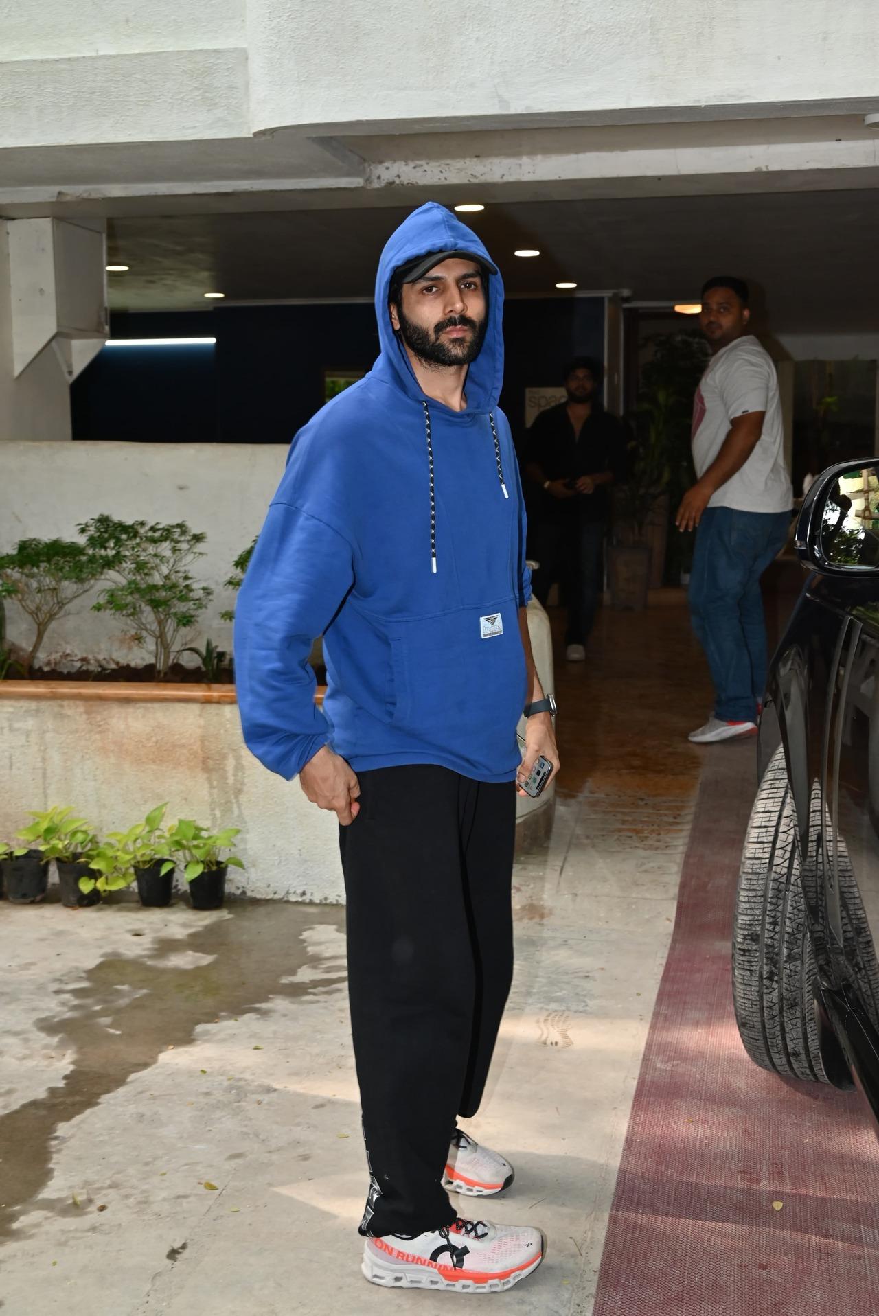 Kartik Aaryan spotted in the city in a blue hoodie and black track pants
