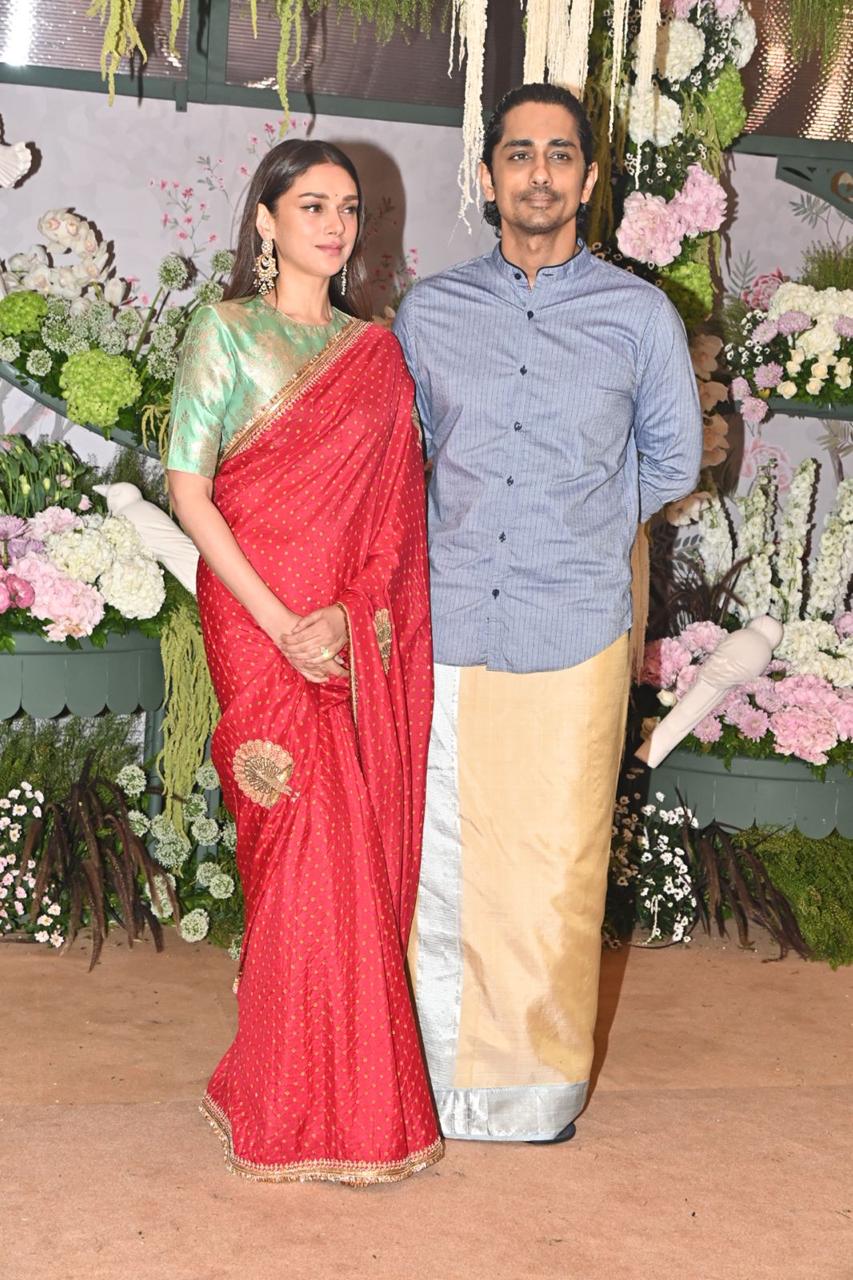 Aditi Rao Hydari stunned in a red saree which she paired with a green shirt blouse