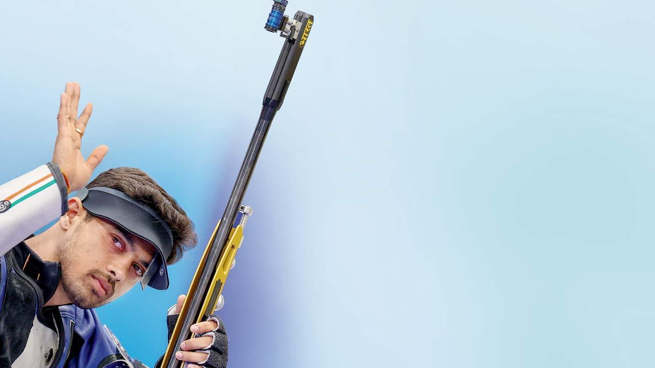 India’s Swapnil Kusale waves to the crowd after the 50m rifle 3 positions final in Chateauroux,  near Paris yesterday