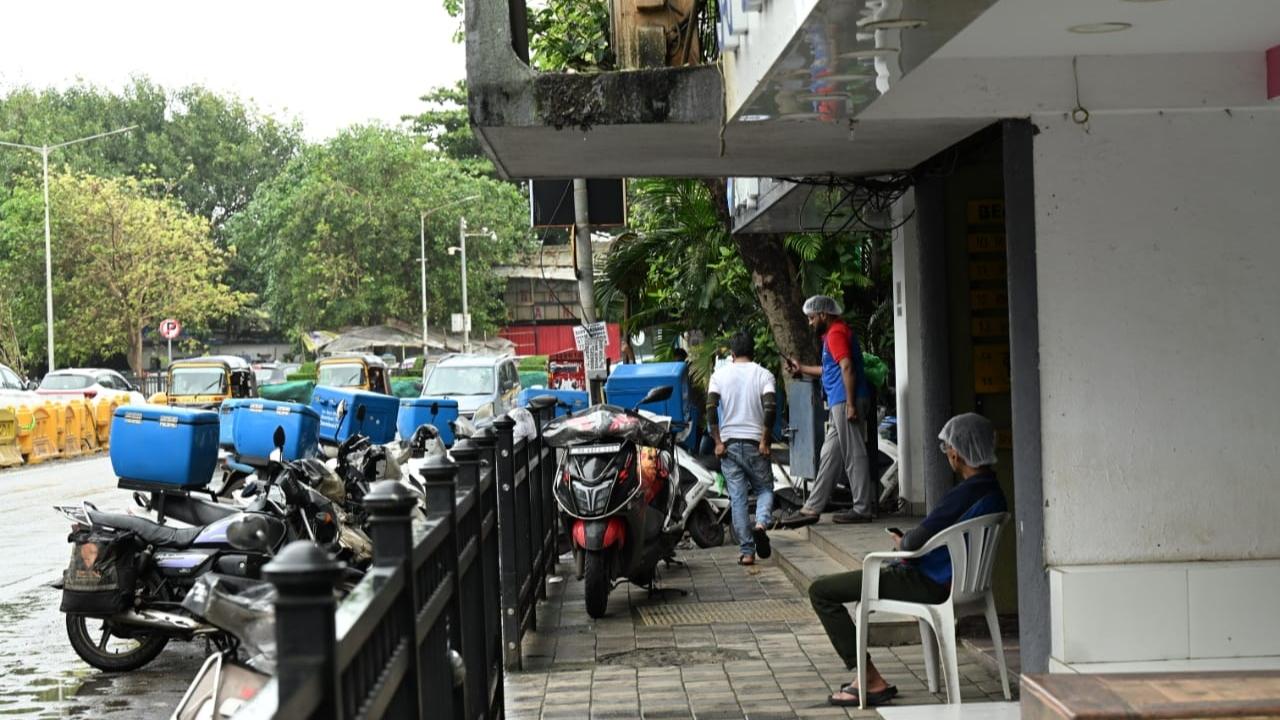 A passerby said that around 6 to 8 feet stretch of road was blocked by parked vehicles making it difficult to access the footpath