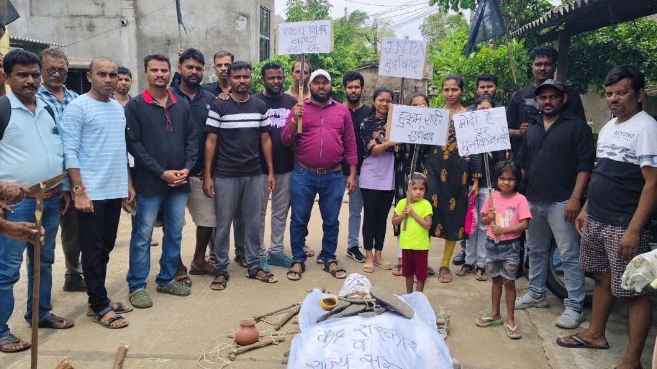 The protestors held banners, sloganeered as they marched to protest against Vadvhan port ahead of the foundation laying ceremony. 
