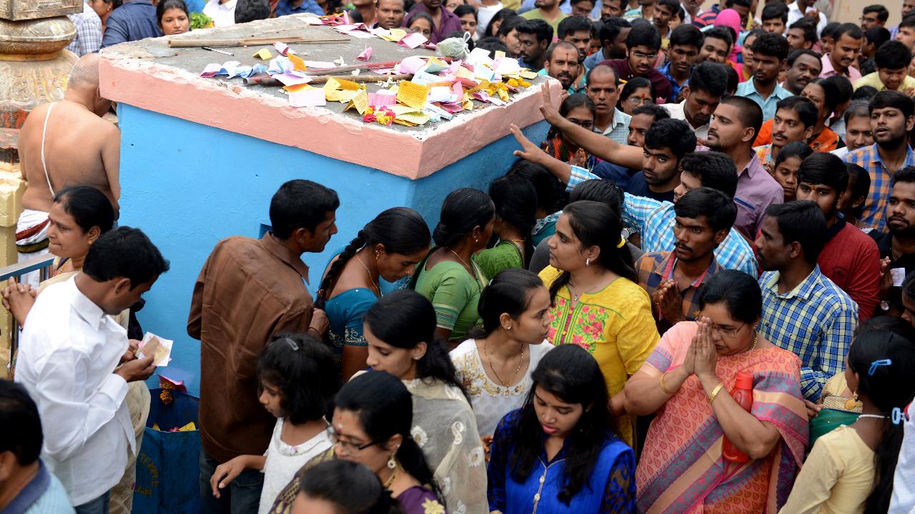 The ritual goes as follows: One is supposed to take 11 parikramas (laps) of the temple sanctum while asking for their wish to be fulfilled. Once the visa is approved, they revisit the temple and take 108 parikramas as a sign of gratitude. (File Pic/AFP)