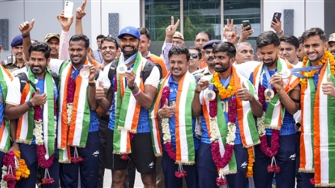 The Indian men's hockey team claimed a bronze medal after defeating Spain by 2-1 at the Paris Olympics 2024. People gathered in huge numbers at the Indira Gandhi International Airport to get a glimpse of the bronze medalists