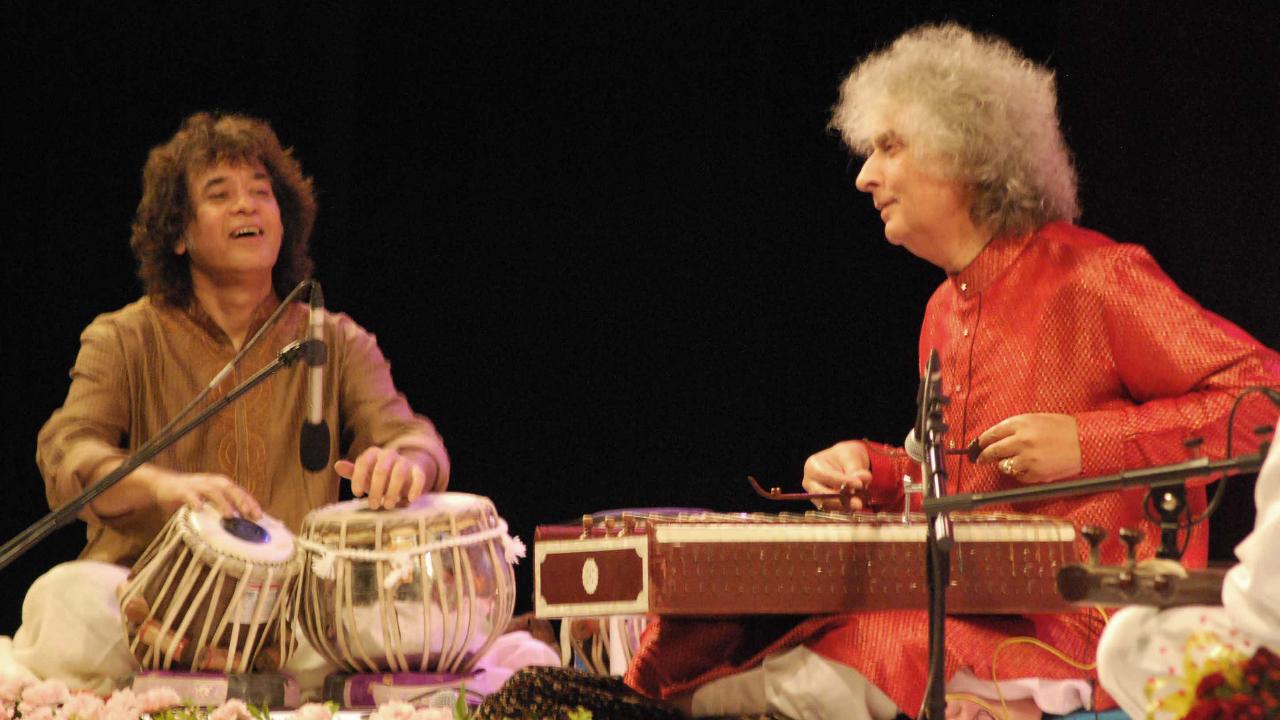 Jugalbandi of tabla wizard Ustad Zakir Hussain and santoor maestro Pandit Shivkumar Sharma as they perform rogether at Ganesh Kala Krida Rangmanch
A journey through his musical career