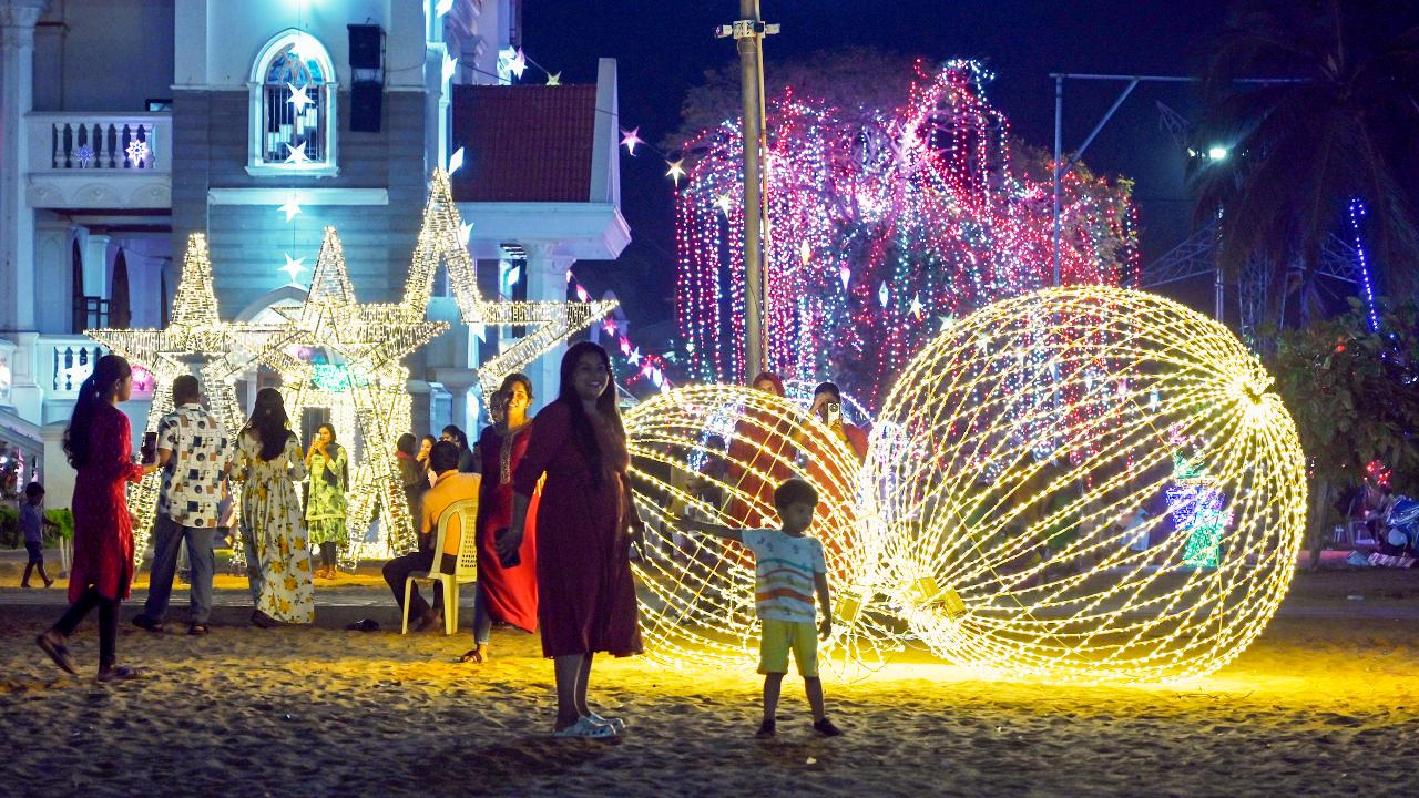 People visit the decorated Vettukad church ahead of Christmas, in Thiruvananthapuram