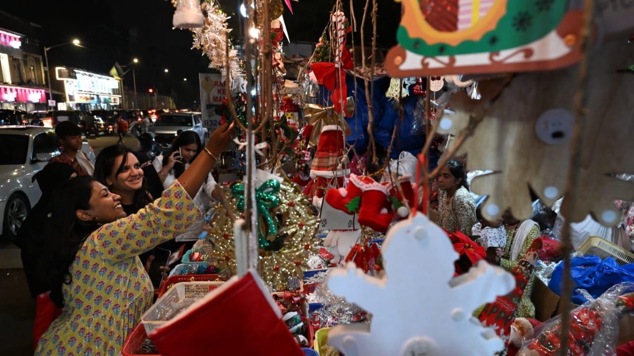 In Pic: Mini Santa Claus, vibrant stars, baubles, candy canes, and more -- people choose from a variety of décor items to adorn their Christmas trees