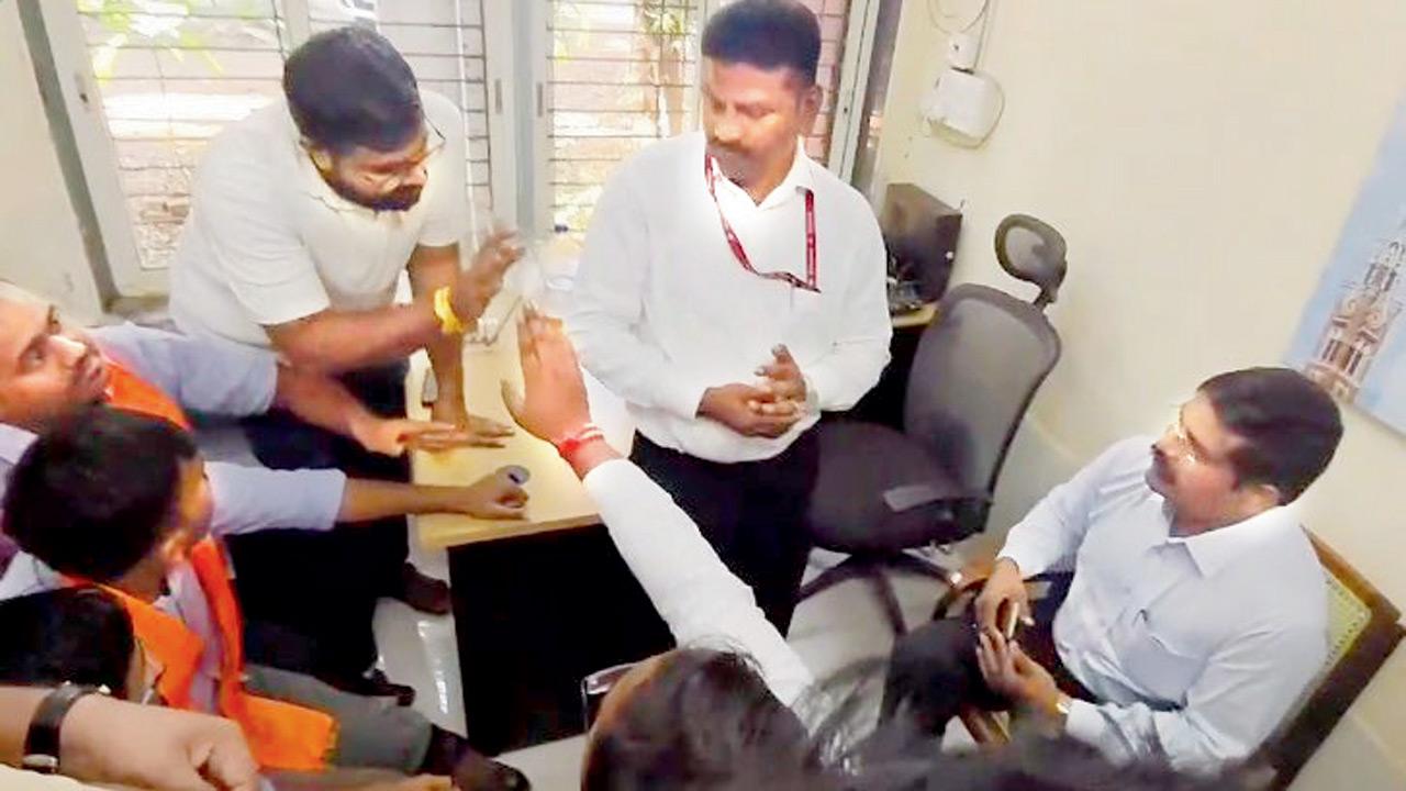 ABVP activists and students arguing with the hostel warden 