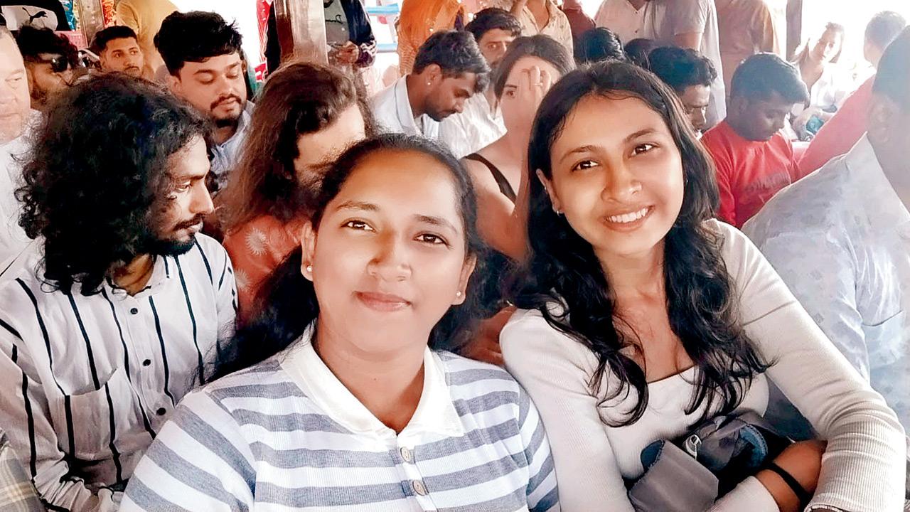 Aryaa Jadhav (right) with her relative Viddhi Jadhav (left) on the ferry