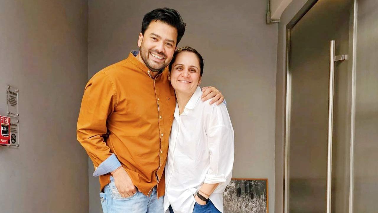 With her husband, Rahul Verma