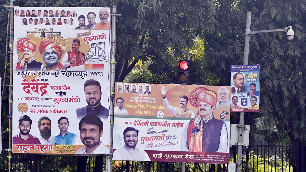 Political posters blocking a signal at Kalanagar, Bandra East. Pic/Ashish Raje