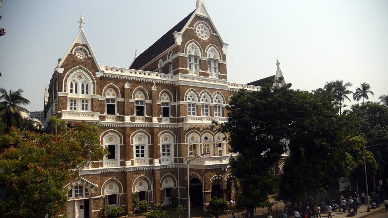 The façade once had a direct sea-facing view. The statue of Athena (goddess of learning) holding a lit torch and book, was destroyed and had to be replaced by an identical statue. Few public buildings in Mumbai display a statue atop as their crowning feature. CSMT (formerly Victoria Terminus) is one of them. FILE PICS