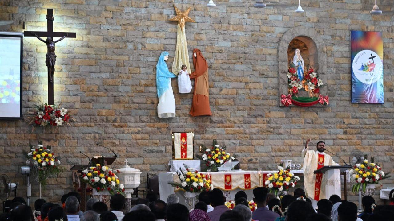 Devotees gather at Orlem Church, Malad, on Christmas morning to celebrate the birth of Jesus Christ