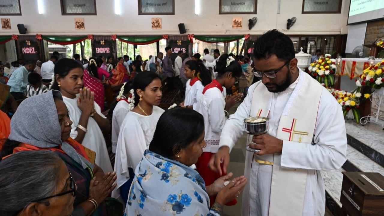 Christmas sweets are distributed among the faithful, symbolising the joy and togetherness that the season brings