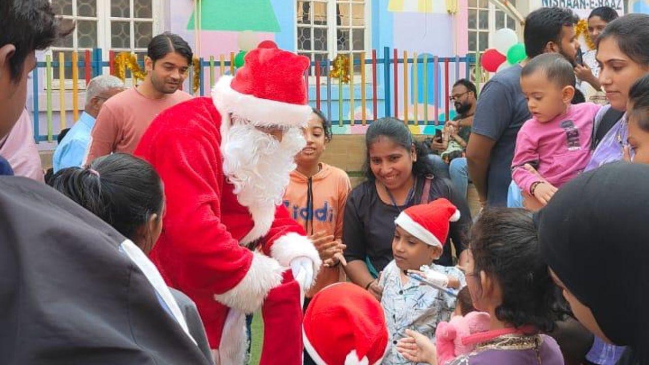 The celebration began with an enchanting magic show, followed by lively dance performances, carol singing, exciting games, and a joyous cake-cutting ceremony. The children donned festive Christmas hats and shared moments of fun and laughter. The event concluded with a special visit from Santa, who greeted the brave hearts and gave chocolates, snack boxes, and thoughtful gifts. Pic/Bai Jerbai Wadia Hospital for Children