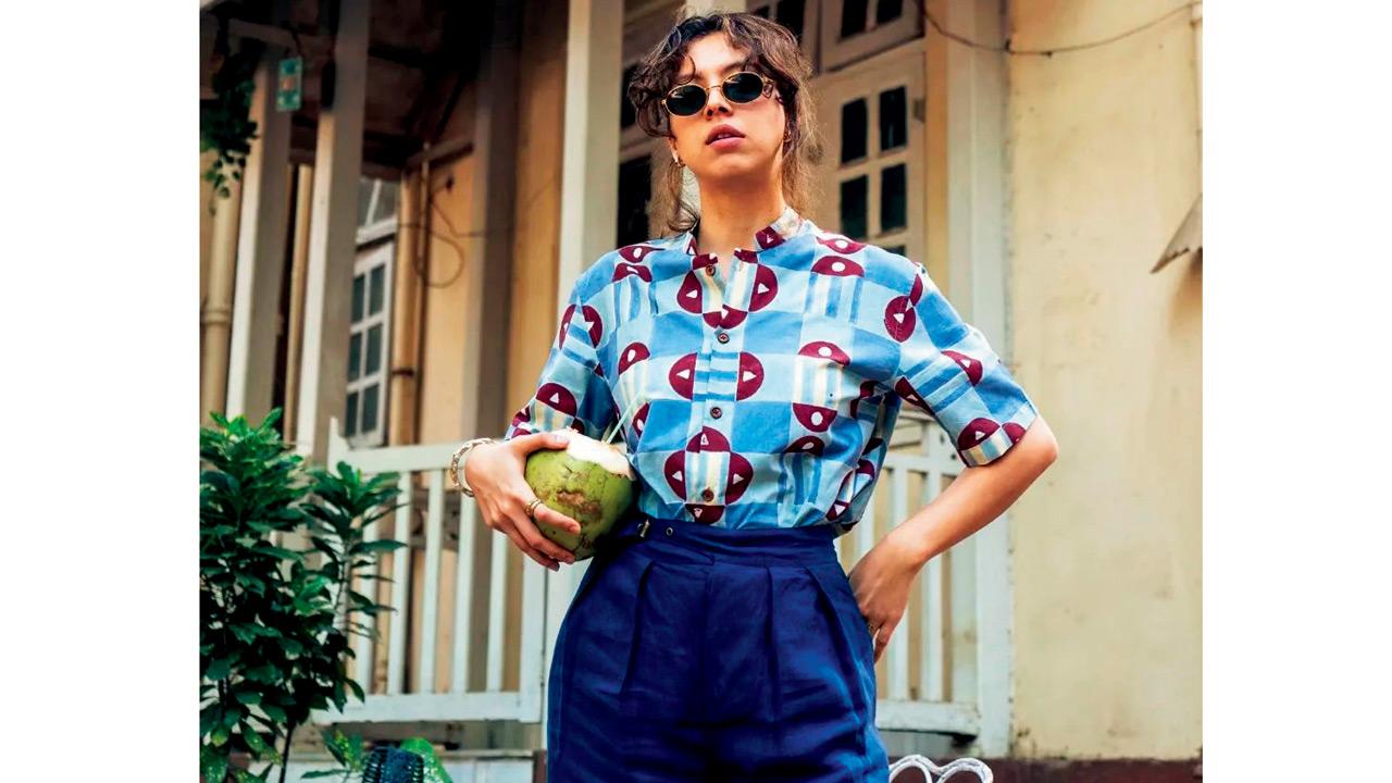 A block printed shirt paired with blue trousers