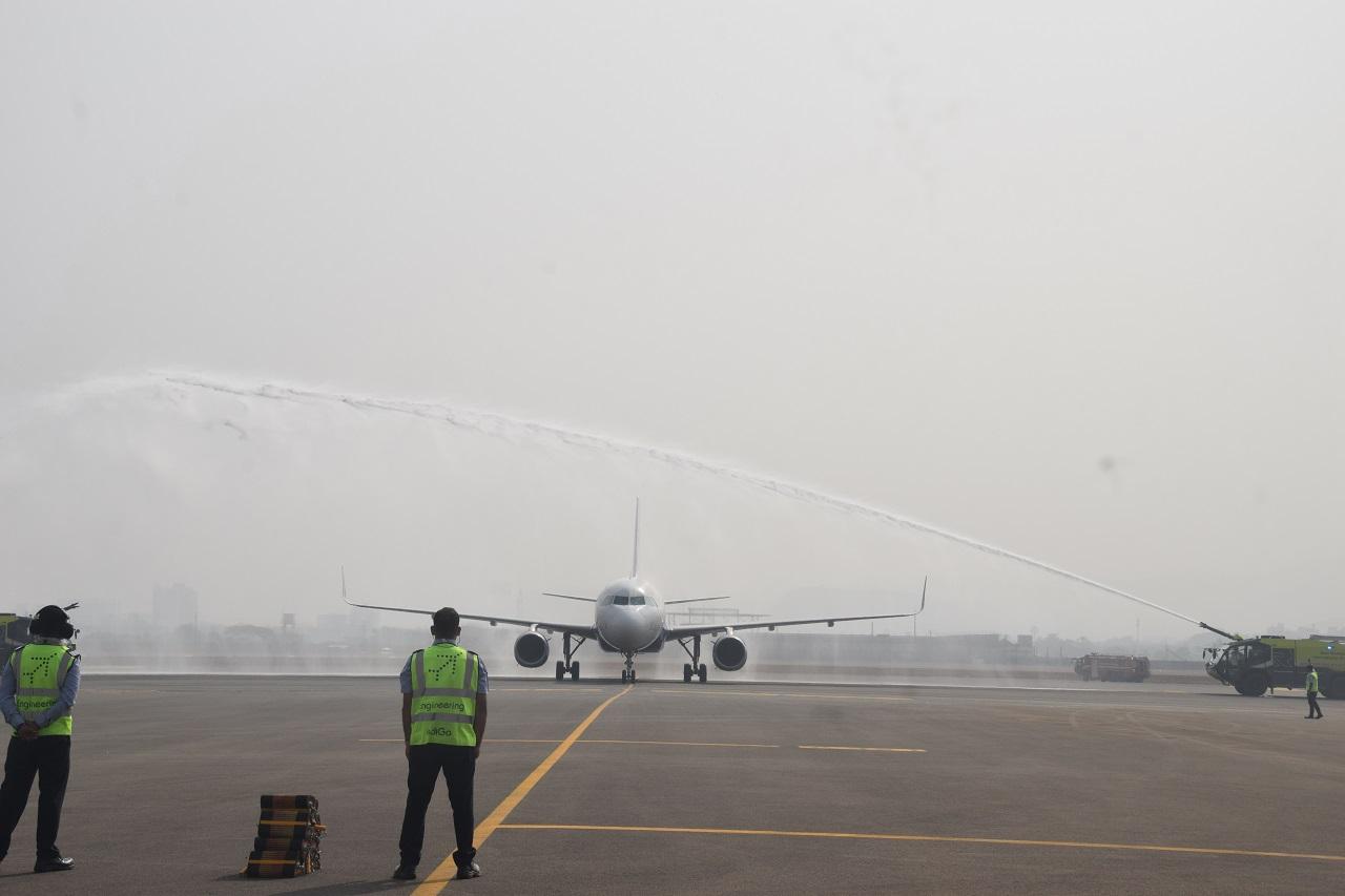 The aircraft received a traditional water salute from two Crash Fire Tenders (CFT)