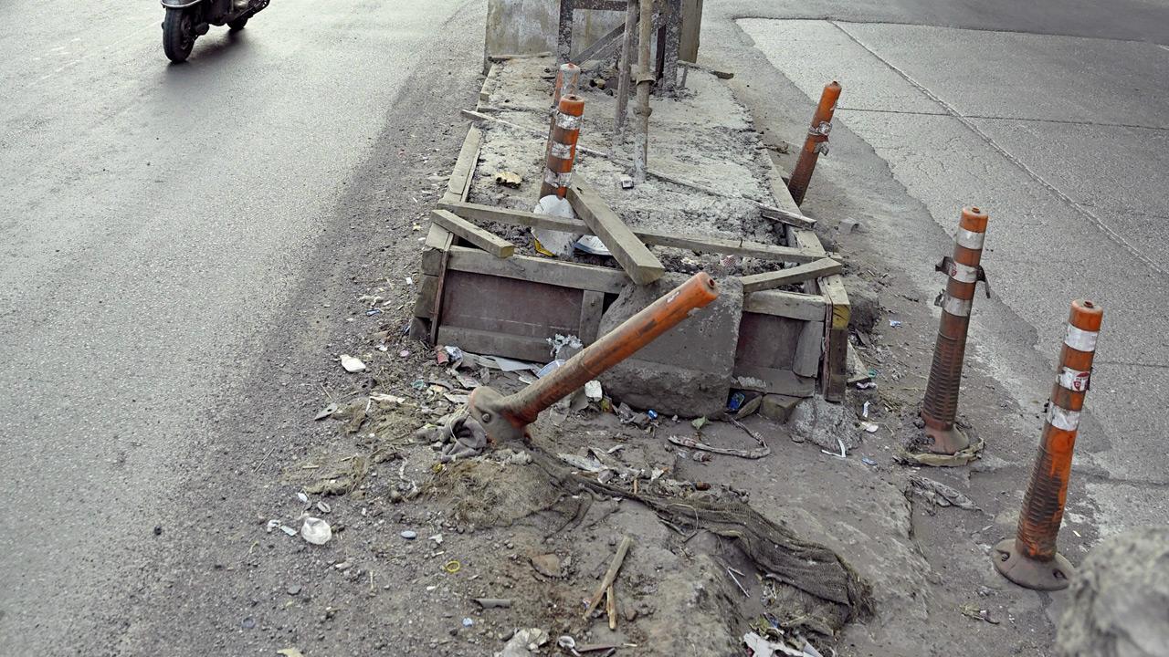 Damaged bollards on the stretch between Bandra to Dahisar toll naka. PIC/ASHISH RAJE