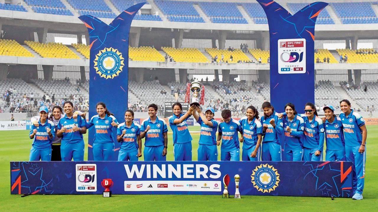 Indian players after winning the ODI series v WI; (below) Deepti Sharma celebrates a wicket. Pics/PTI, BCCI