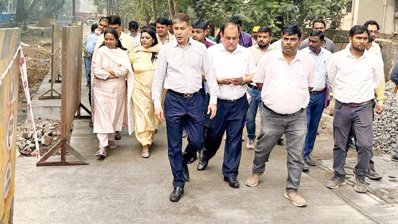 BMC Commissioner Bhushan Gagrani (first row, extreme left) at a work site in Borivli on Thursday