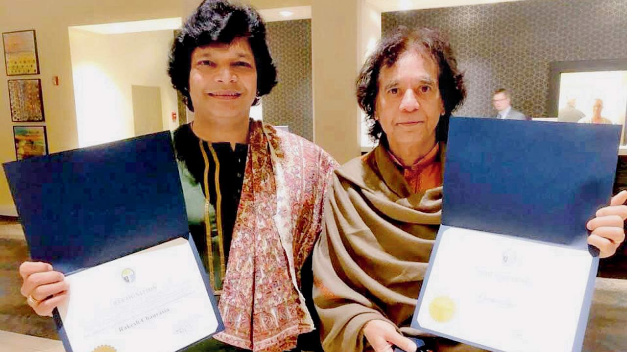 Flautist Rakesh Chaurasia with tabla maestro Zakir Hussain 