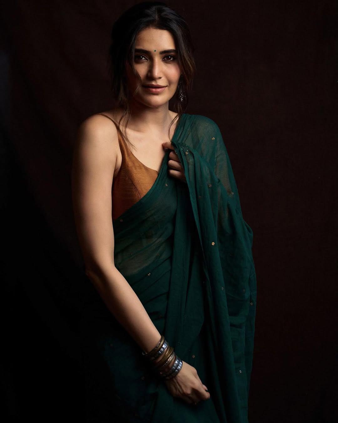 The actress wore a simple green saree paired with a strappy brown blouse and styled her hair in a messy yet chic bun