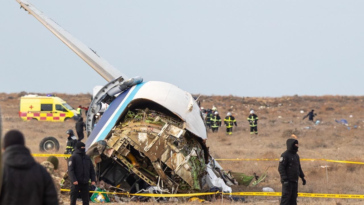 Emergency specialists work at the crash site of an Azerbaijan Airlines passenger jet near the western Kazakh city of Aktau. Pics/AFP