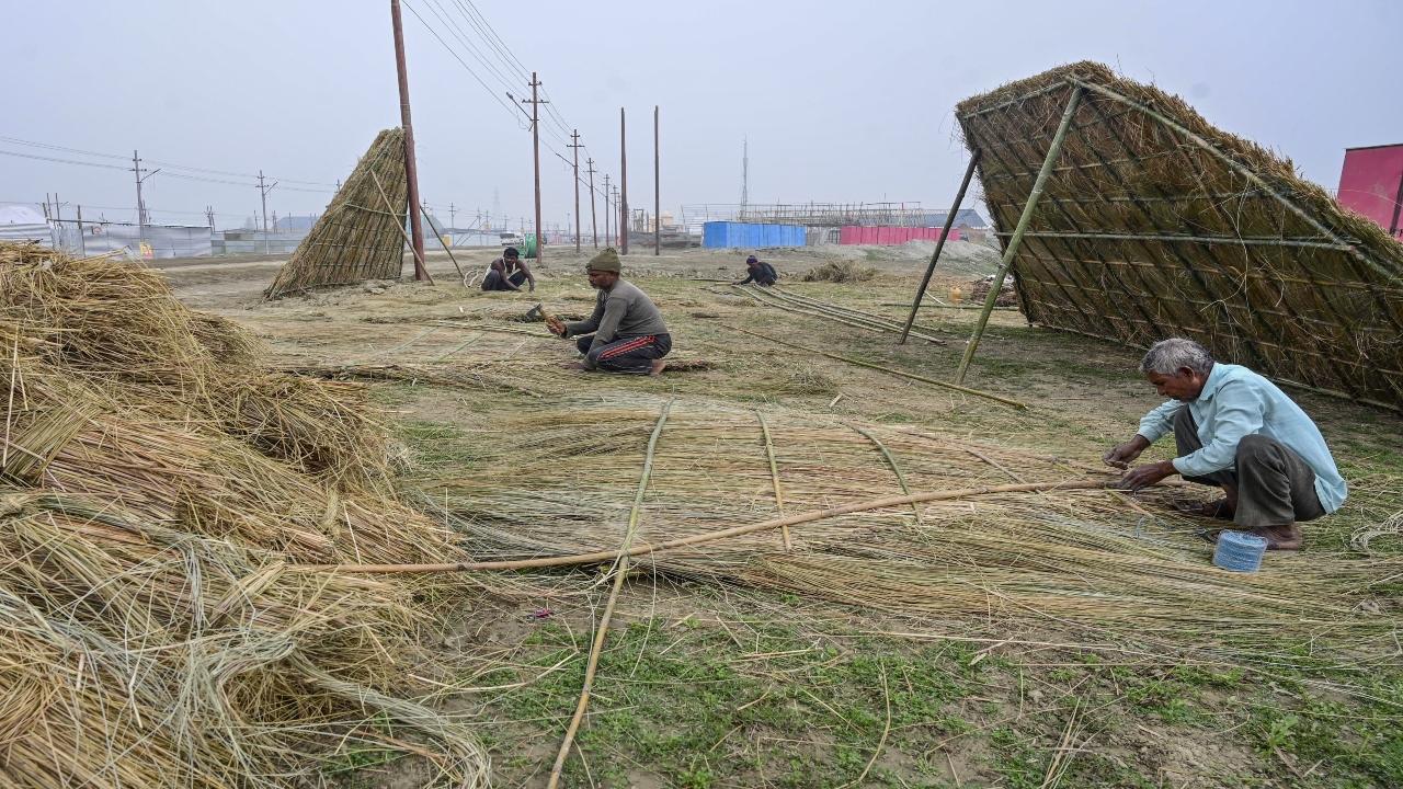 Workers make bamboo huts for devotees. Renovation works of 92 roads and beautification of 17 major roads are nearing completion, as per the government statement