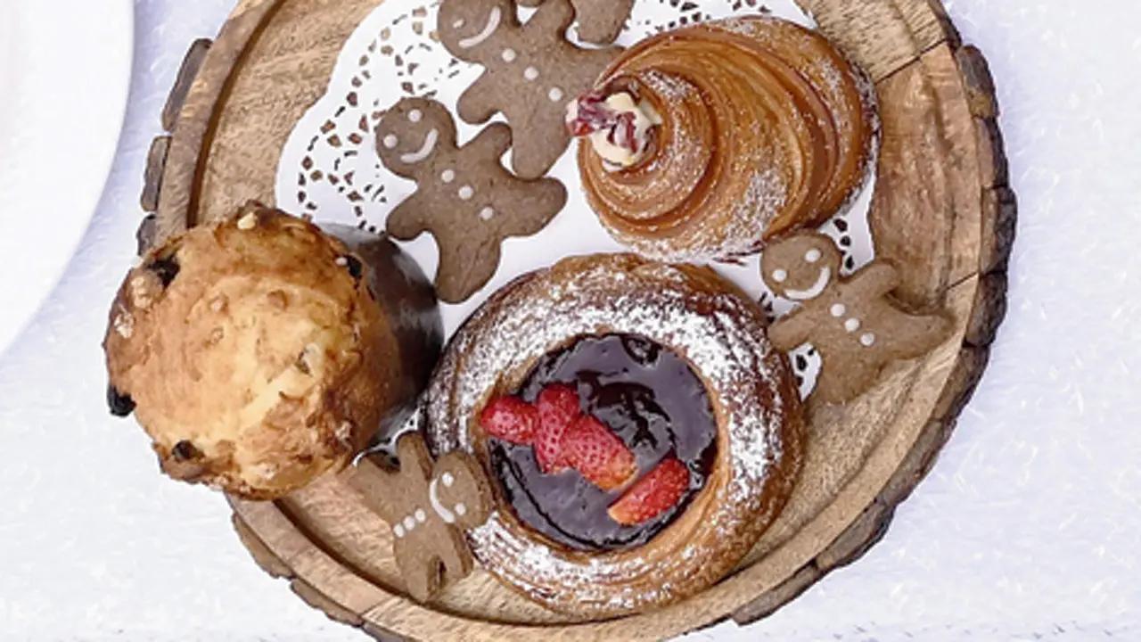 White chocolate, cranberry cruffin, strawberry danish, panettone, and gingerbread cookies, Mag. St. Bread Co.