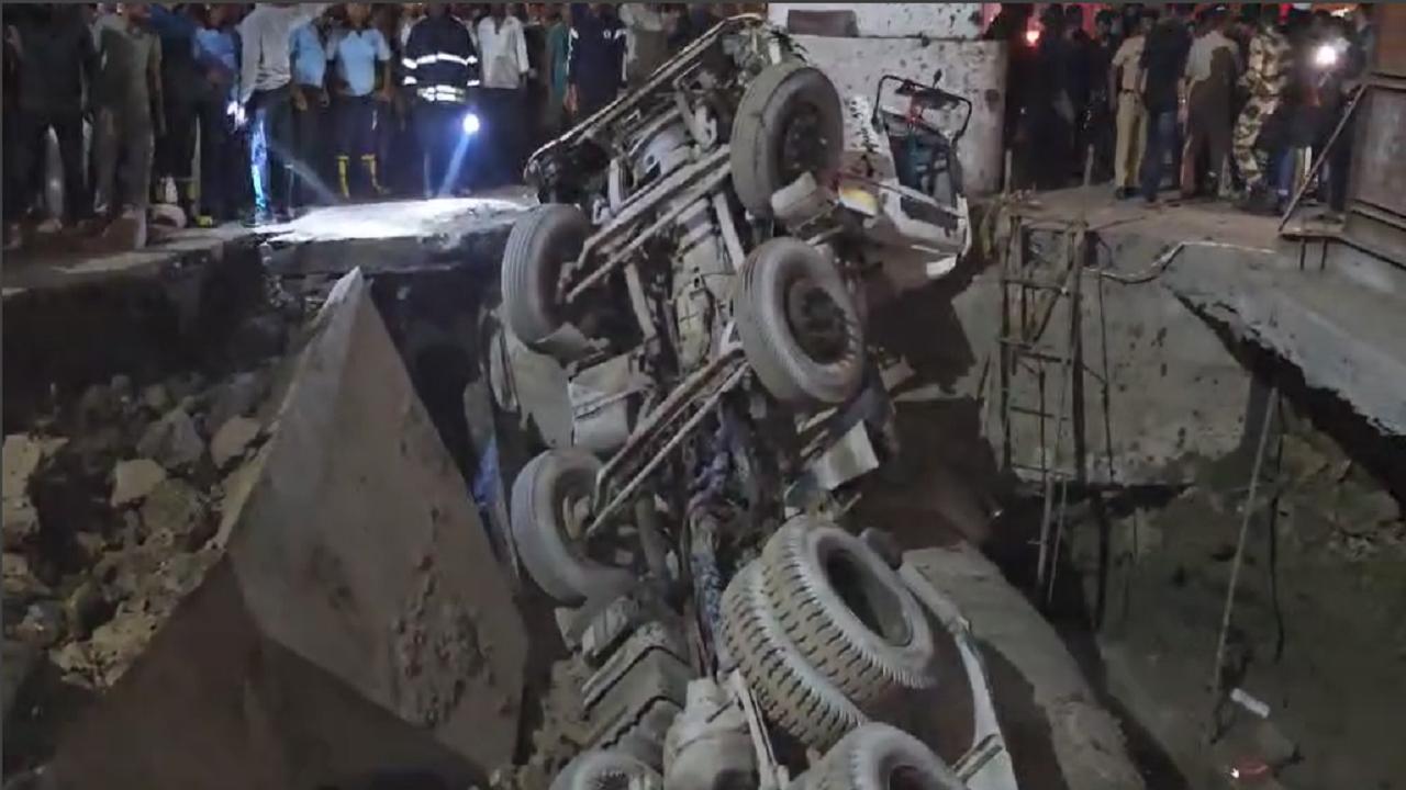Watch video: Road caves in at Mira Bhayandar, causes dumper to overturn