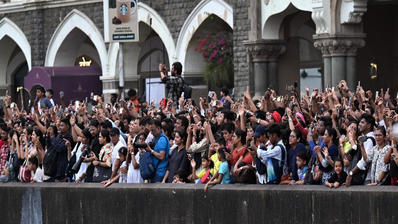 As the naval personnel performed the stunts, they were met with cheers from the crowd