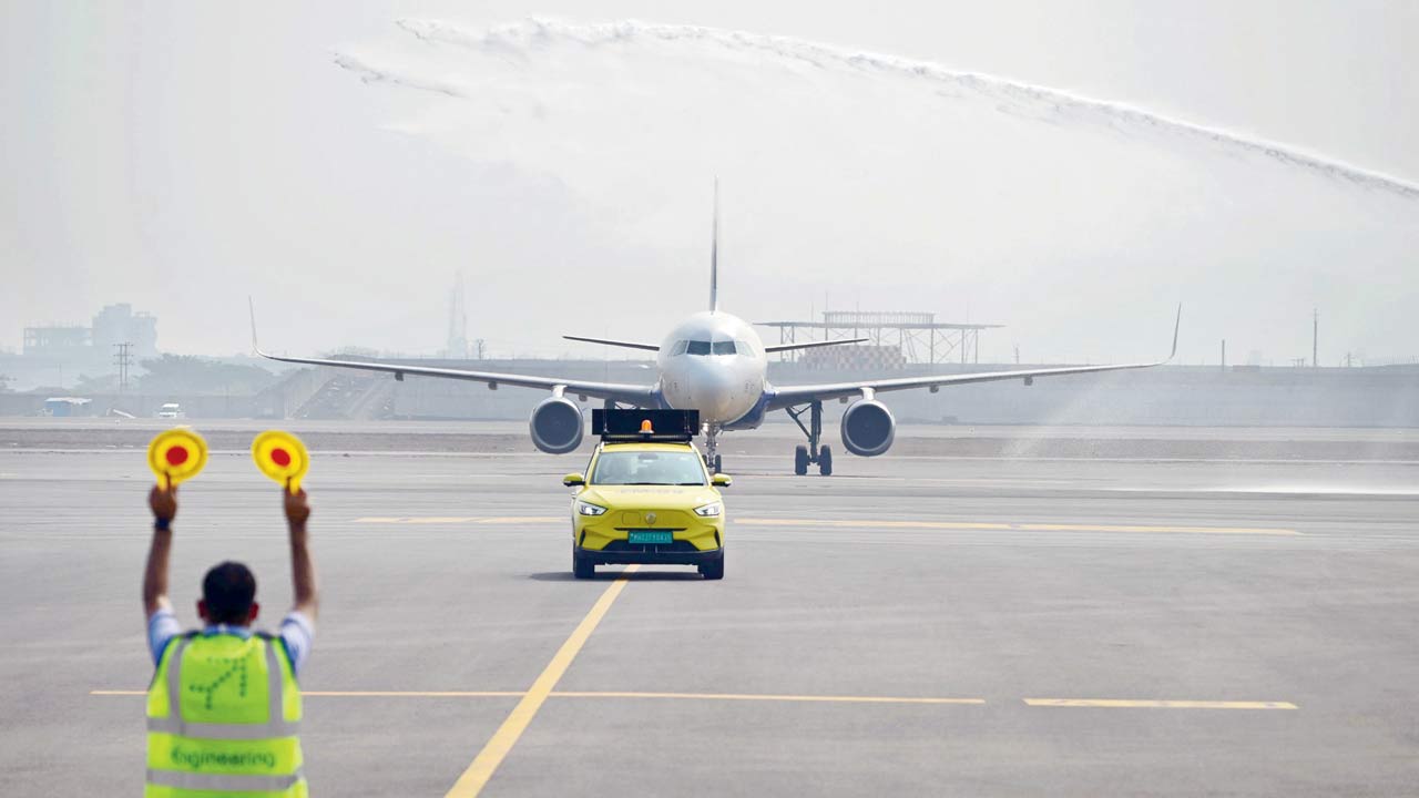 The aircraft receiving a traditional water salute. Pics/Nimesh Dave