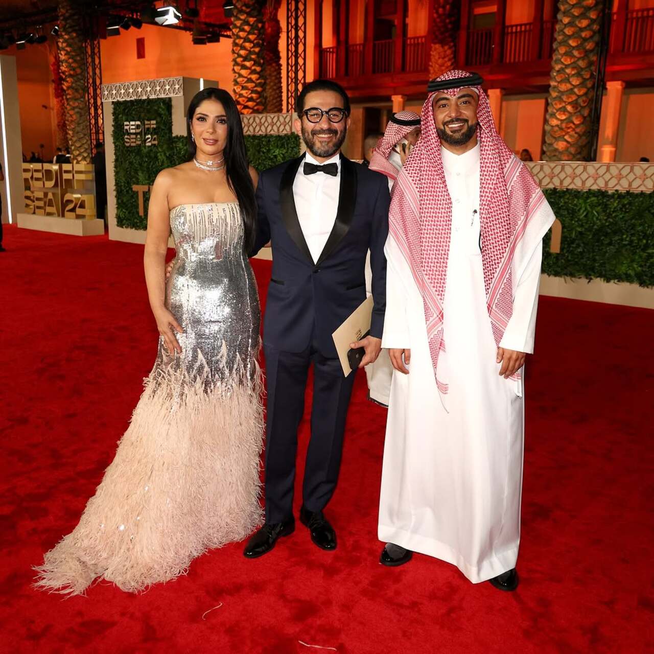 Acting CEO and Board Member of the Red Sea Film Foundation, Mohammed Asseri with honoree Mona Zaki and Ahmed Helmy