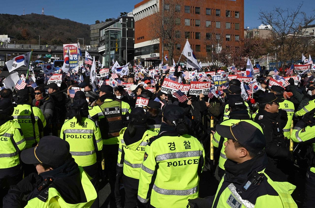 The Seoul Western District Court issued warrants to detain Yoon and to search the presidential office and residence in central Seoul, according to a statement from the Corruption Investigation Office for High-Ranking Officials, which is leading a joint investigation with police and military authorities