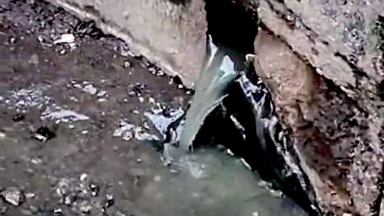 Sewage water entering the colony through a wall