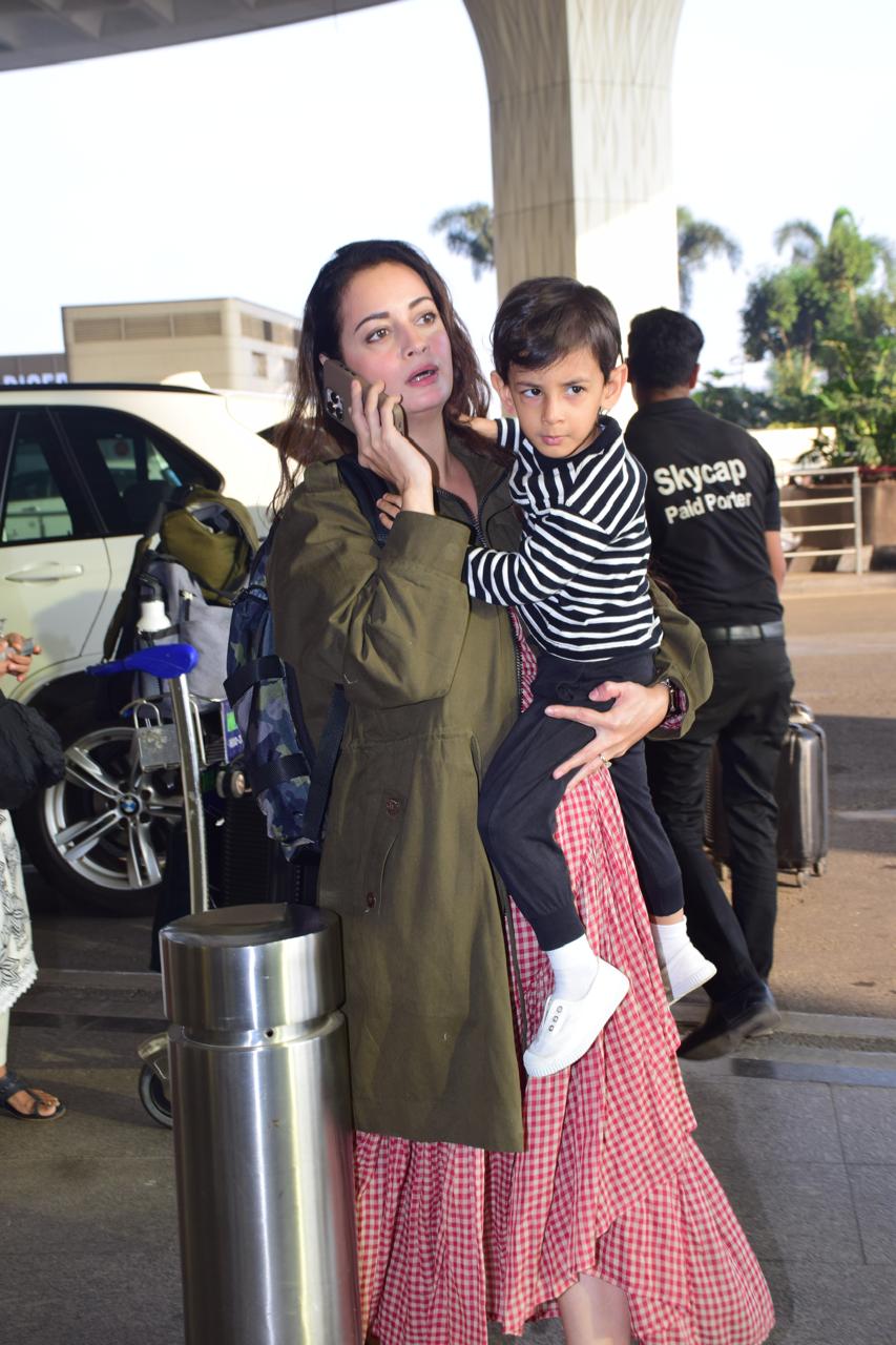 Dia Mirza was spotted at Mumbai airport with her son. The actress looked elegant in a beautiful pink dress