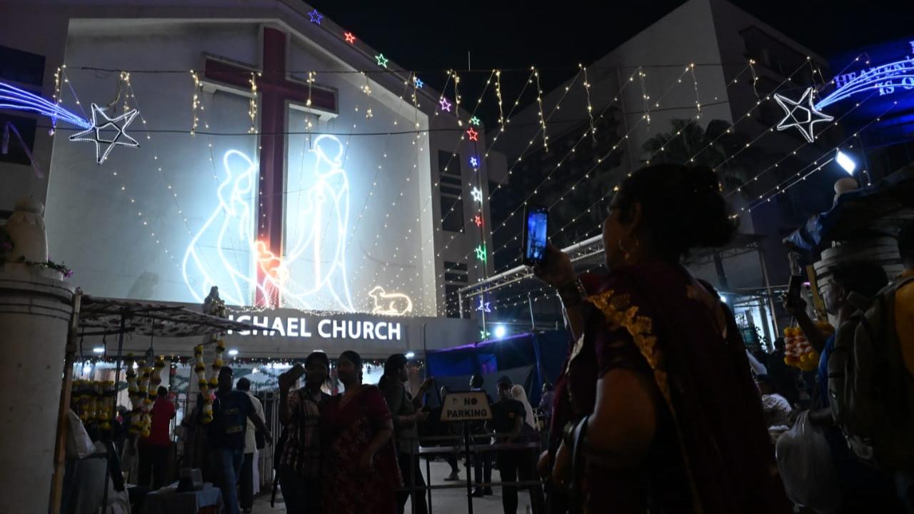 The festive season sees different parts of Mumbai in red and green and all lit up and instantly makes people happy and the festivities around St Michael's Church in Mahim showcases the spirit in more than one way