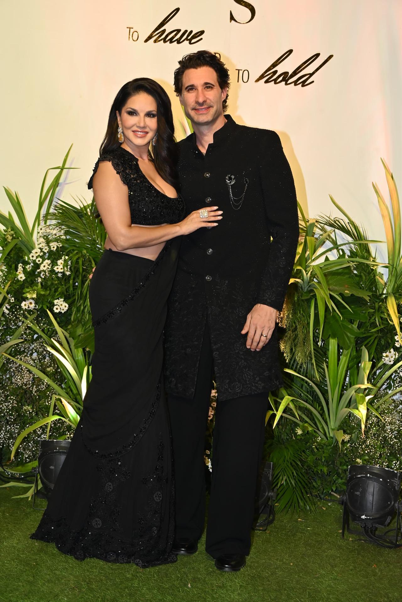 Kashyap's Kennedy actress Sunny Leone twinned with her husband Daniel Weber in black.