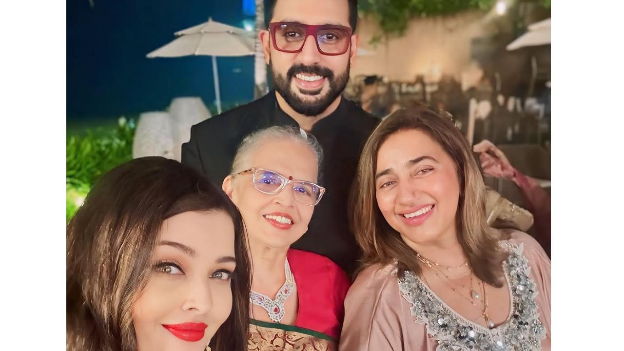 Amidst divorce rumours, a happy picture of Aishwarya Rai and Abhishek Bachchan posing at a family function has surfaced. Read More