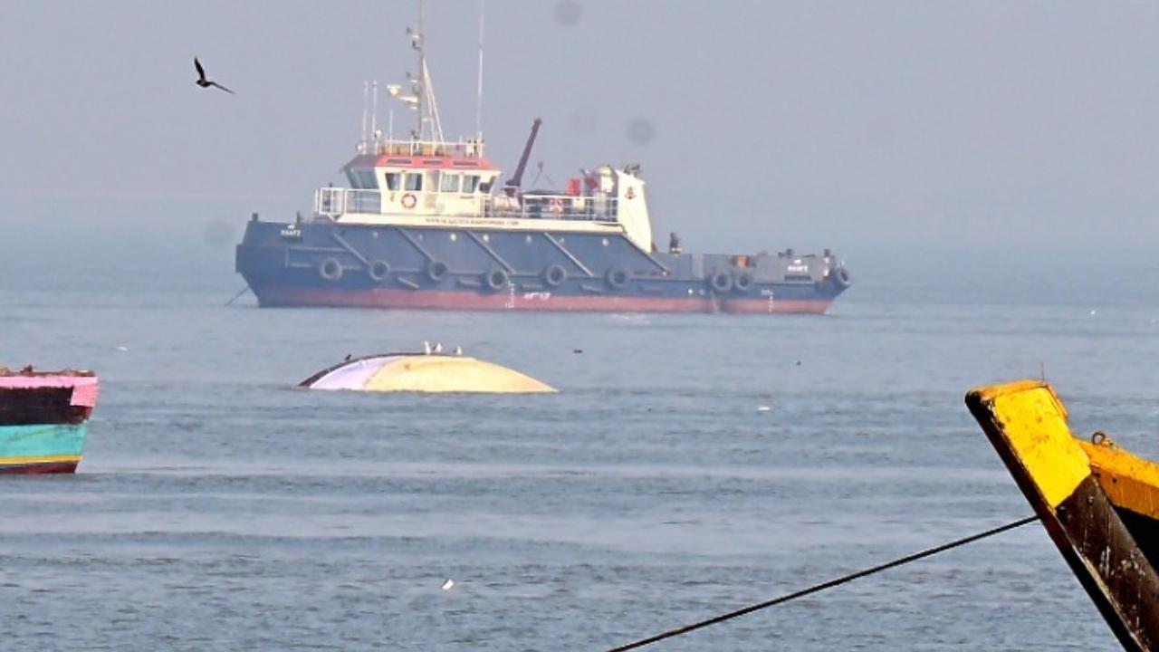 Body of man missing after ferry-Navy craft collision found, toll rises to 14