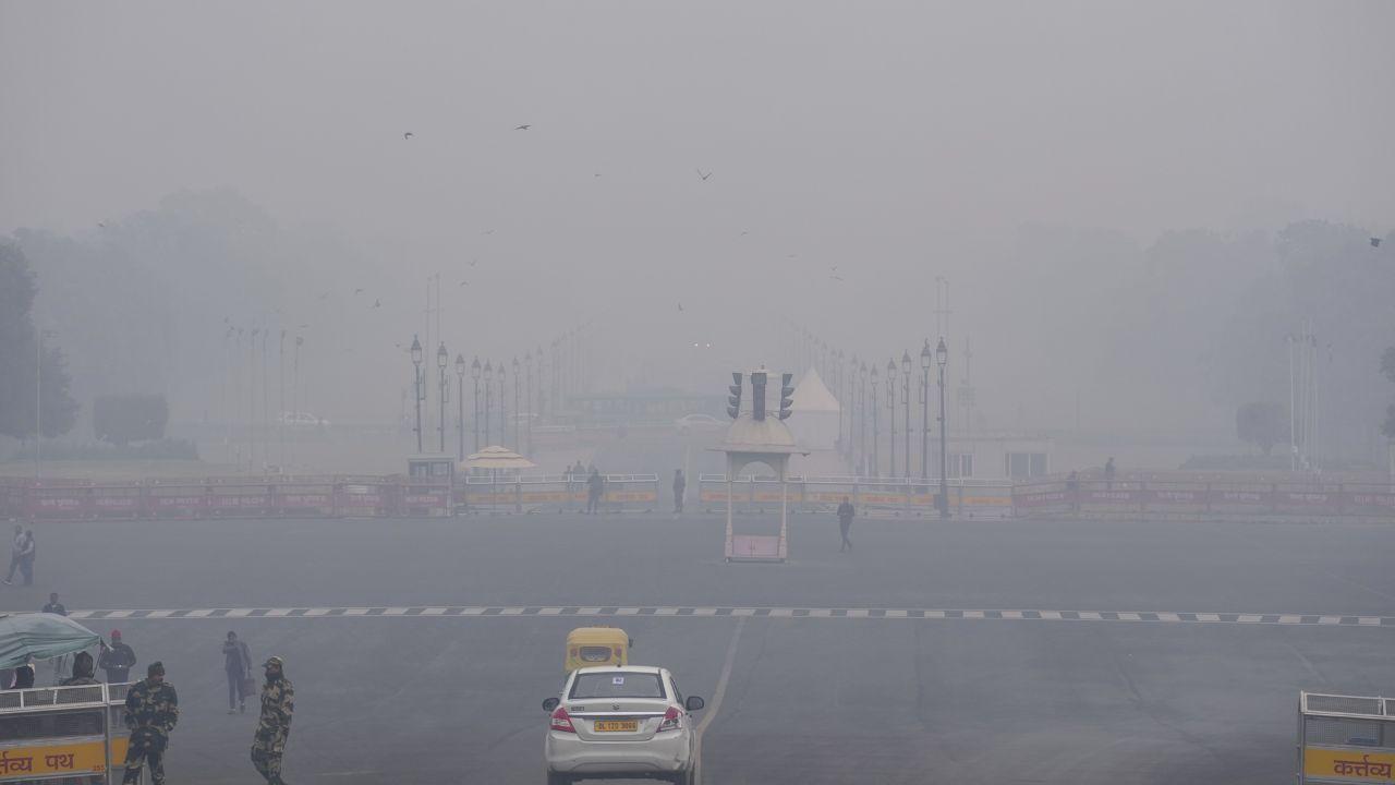 The minimum temperature recorded in the city was 7 degrees Celsius. (In Pic: Commuters at Vijay Chowk on a foggy winter morning, in New Delhi on Monday)