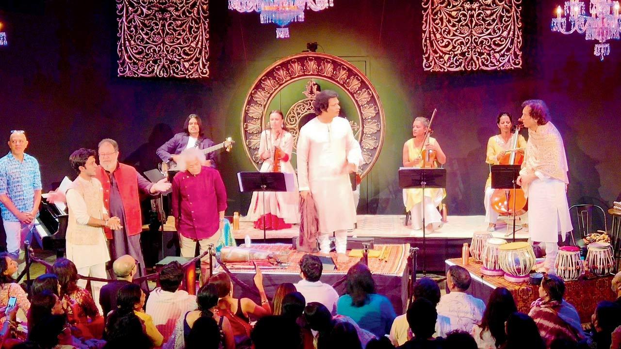 (From left) Zubin Balaporia, Zahan Kapoor, Kunal Kapoor, Sheldon D’Silva (on guitar), Taufiq Qureshi, Rakesh Chaurasia and Ustad Zakir Hussain with the strings ensemble