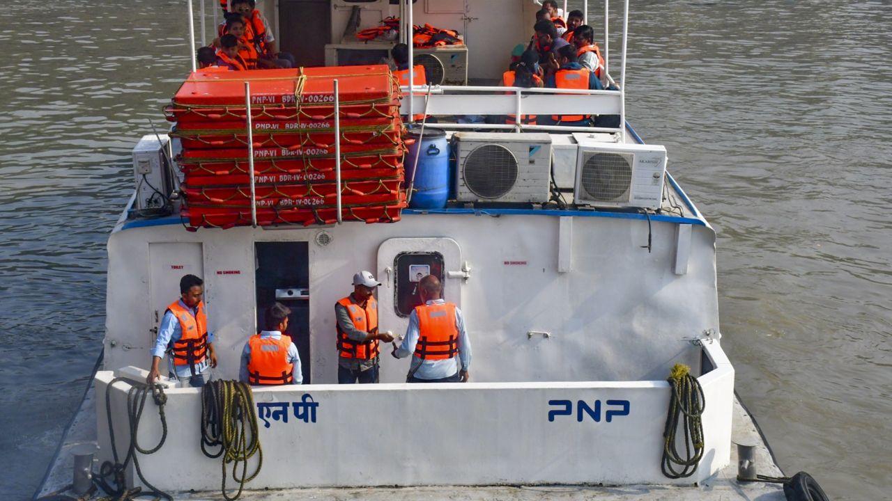 A Navy personnel and two contractual naval employees were among the ones killed. (In Pic: Passengers and staff wear life jackets during a ferry ride following an incident)