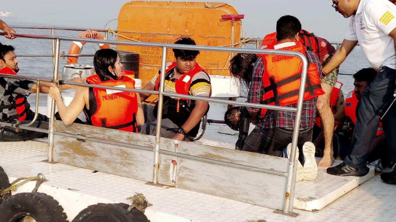 The boat had departed from the Gateway of India for Elephanta Caves about 45 minutes before the incident, which occurred near Butcher Island. (In Pic: Passengers being rescued after a ferry capsized off Mumbai coast when a Navy craft crashed into it)