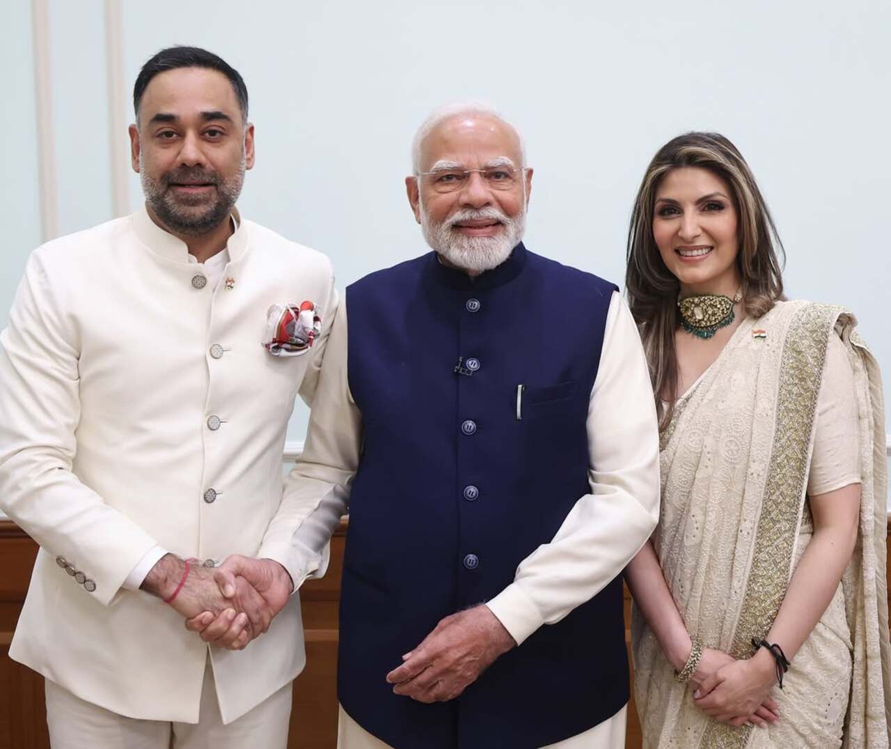 Riddhi Kapoor Sahni and her husband Bharat Sahni pose with the PM