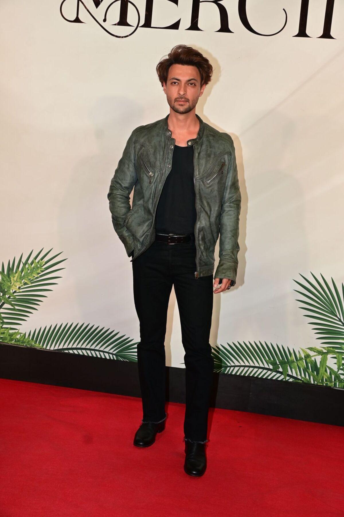 Aayush Sharma was also spotted at her wife's new restaurant. He was wearing an olive green leather jacket with black trousers and a shirt. 