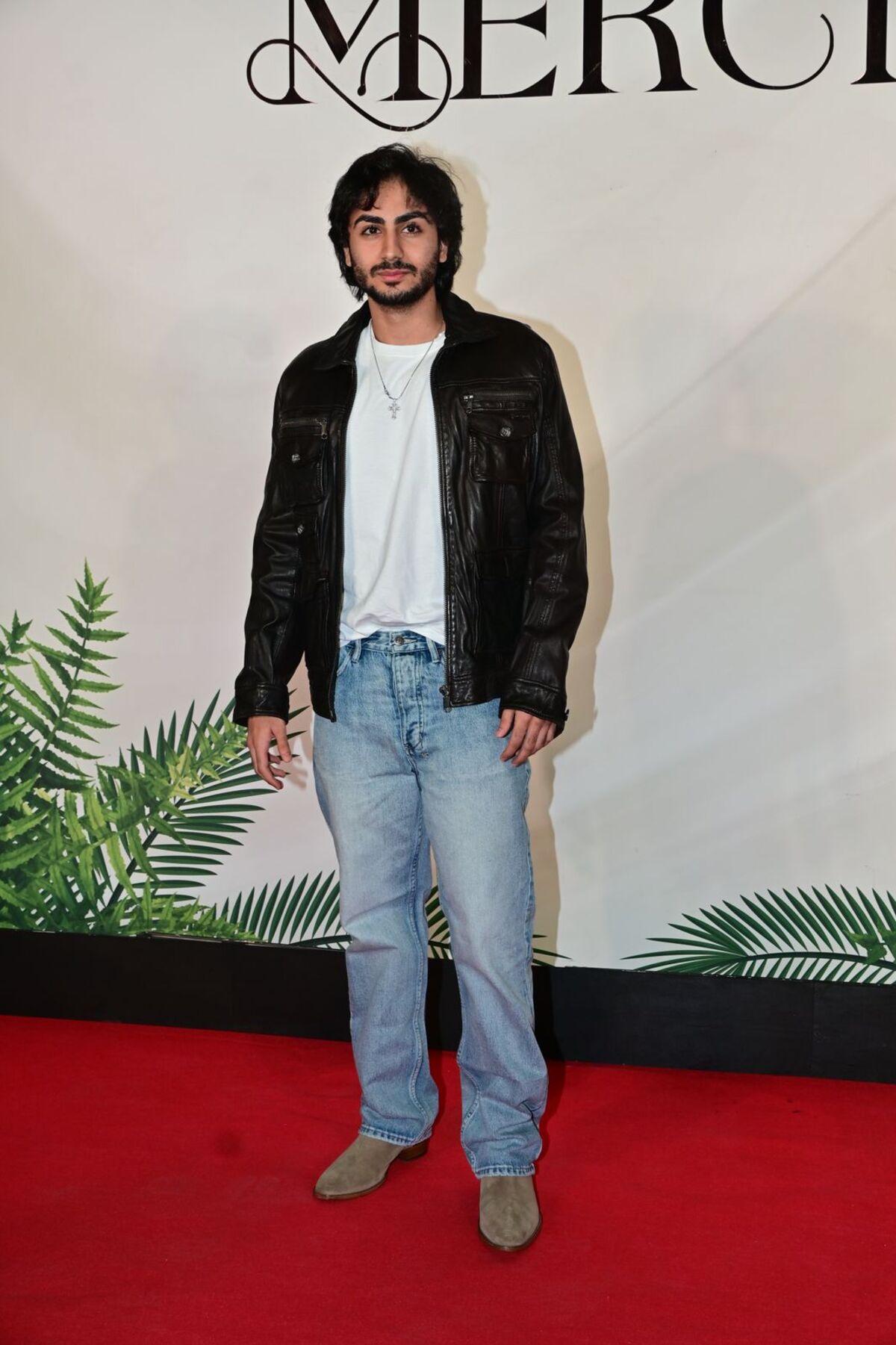 Arhaan Khan was spotted at Arpita Khan's new restaurant Mercii. He was wearing a white tee with blue denim. He also paired a black leather jacket with the outfit.
